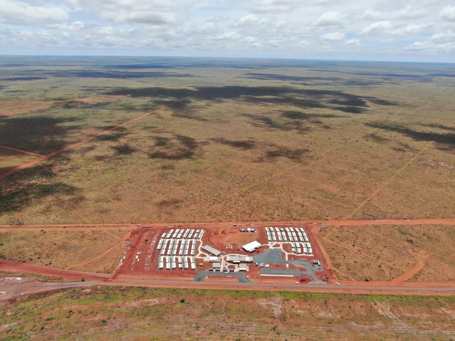 Aerial view of a remote mine site under construction