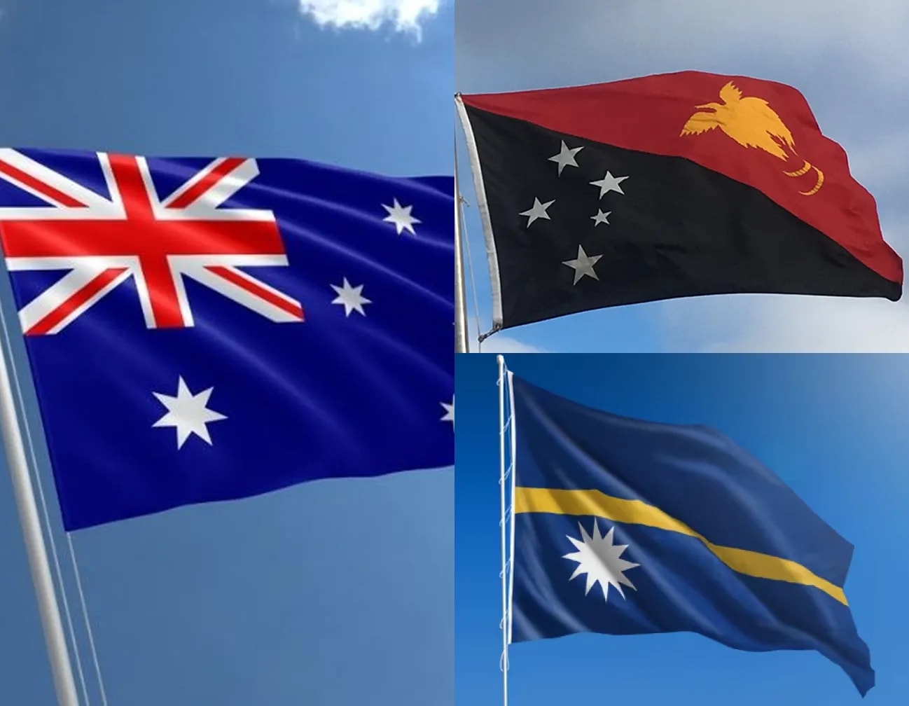 Australian, Papua New Guinean and dei-Naoero flags flying against a blue sky
